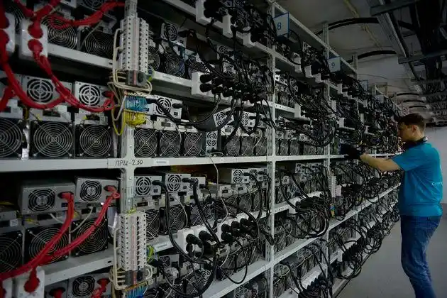 Expansive mining farm with rows of mining machines