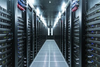 An overhead view of a bustling mining farm showcasing rows of hosted mining rigs in action